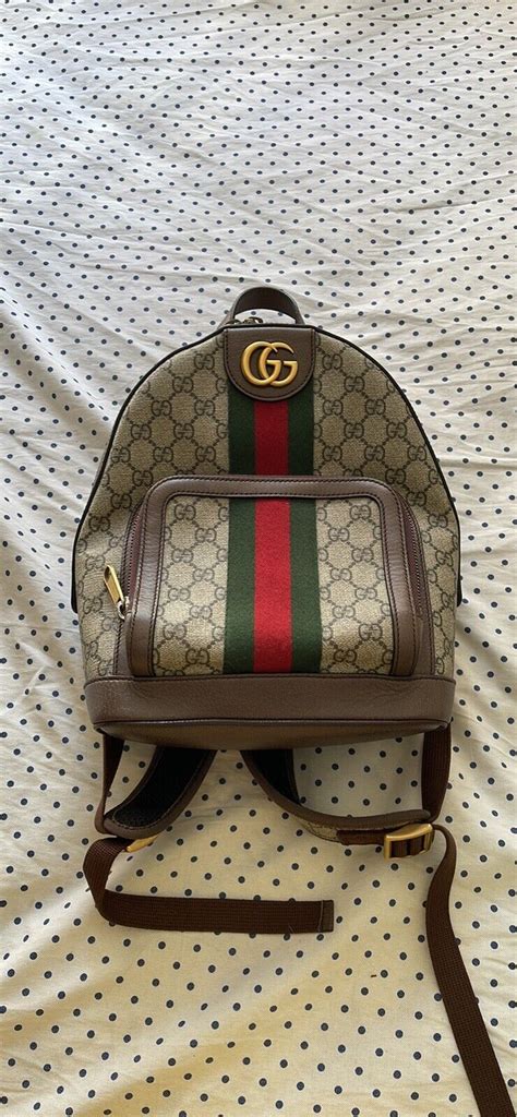 fake brown gucci backpack with red and blue straps|authentic Gucci backpack.